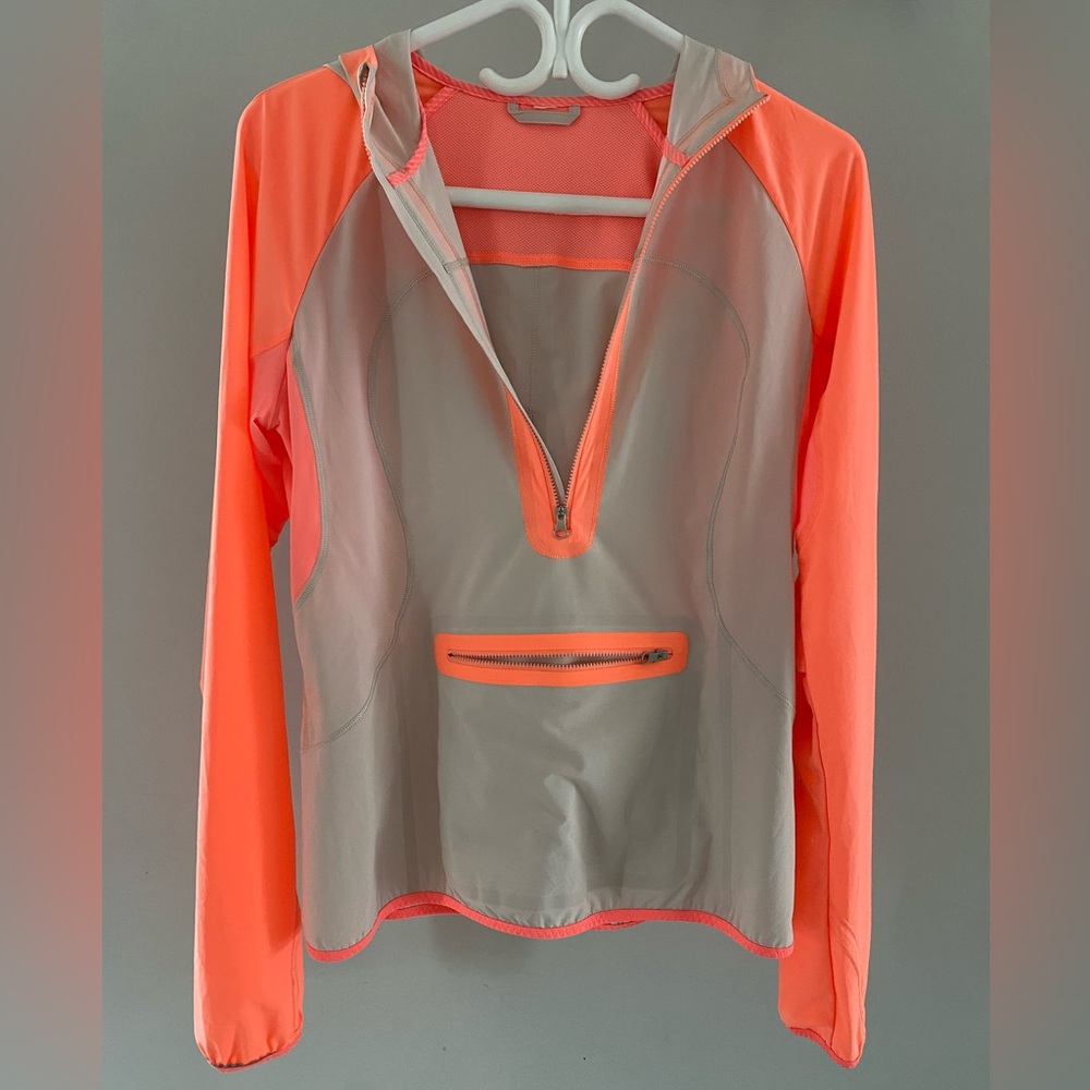 White and Orange stash and dash pull over Lululemon Utility jacket